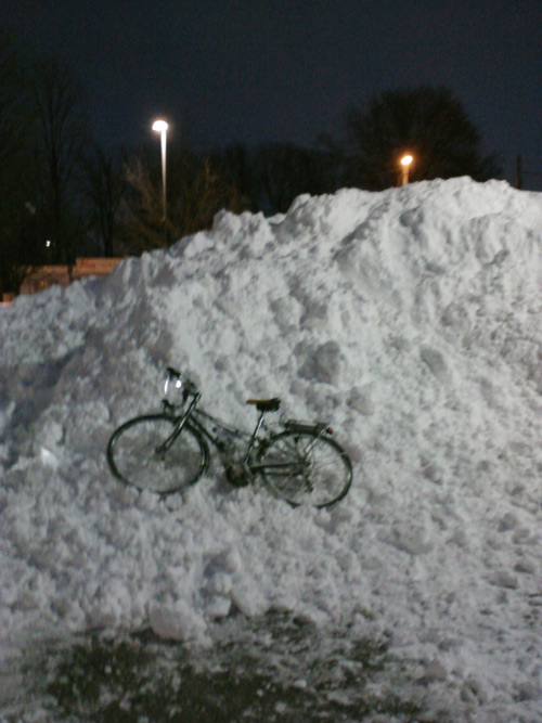 bicycle in a ton of snow.